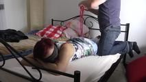 Mystique hogtied on bed 1/2