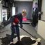 Watch sonja cleaning the room in her shiny nylon Rainwear