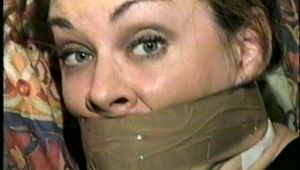 26 YEAR OLD RIVER VERY TIGHTLY WRAP TAPE GAGGED, PANTYHOSE FEET TICKLED, STUFFED MOUTH & DROOLING (D52-8)