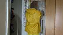 Pia wearing sexy yellow shiny nylon rainwear cleaning up the studio (Video)