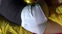 Sandra preparing her shiny nylon bed wearing sexy shiny nylon shorts and a top (Video)