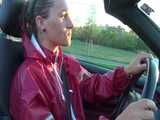 Watch Sandra taking a Walk during very hot Weather enjoying her rubberized oldschool Rainsuit