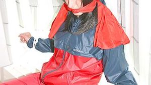 Stella tied and gagged on a heater wearing sexy shiny nylon rainwear and high heels (Pics)