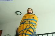 Angel tied up in blankets
