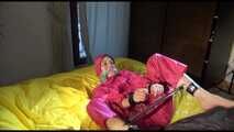 Get 2 Videos with Lucy bound and gagged in her shiny nylon Rainwear from our Archives