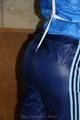 Alina tied and gagged in shiny nylon clothes