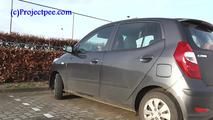 078014 Rachel Evans Pees Beside Her Car