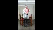 Selfbondage in full PVC outfit and transparent raincoat