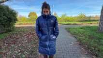 Rey Sanson bound and gagged in a shiny Downcoat