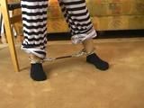 Gina as a powerless convict