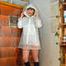 Our new Model in Miss Clara in white K-Way Jacket and transparent raincoat
