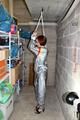 Nicole in an silver shiny PVC sauna suit tied and gagged in an cellar (Pics)