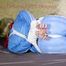 HOT HOT HOT PIA being tied and gagged on a sofa with ropes and a cloth gag wearing a sexy lightblue shiny nylon shorts and a lightblue rain jacket (Pics)