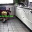SEXY STELLA doing her housework in shiny nylon shorts (Video)