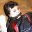 Mara tied and gagged on a bottom-up table wearing a supersexy black/red downwear combination (Pics)