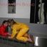 Watching Stella being tied and gagged with ropes and a ballgag on a operating table from Leonie both wearing sexy shiny nylon rainwear (Pics)