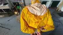 Ms Ungeniert tied and gagged in shiny nylon Rainwear trying to escape