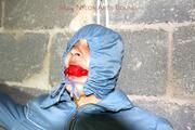 Alina tied and gagged in a skisuit
