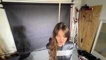 Poor Marie bound and gagged in a shiny nylon Windbreaker