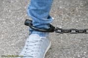 Cuffed to a heavy container