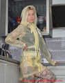 Miss Francine in yellow Schmuddelwedda raincoat