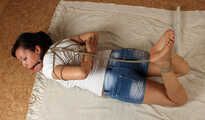 Ballgagged barefoot Lois, hogtied with japanese combat tying system, wiggles on the floor