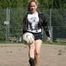 Leonie playing soccer outdoor wearing a sexy black shiny nylon shorts and a sexy black rain jacket (Pics)