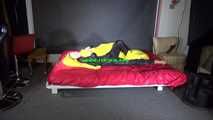 Sexy Sandra wearing sexy shiny nylon rainwear lolling in bed of nylon (Pics)