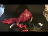 Blonde-haired archive girl posing in sexy shiny nylon rainwear (Video)