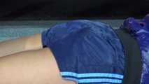 Watching sexy Pia wearing a sexy oldschool blue shiny nylon shorts and a rain jacket during her workout (Video)