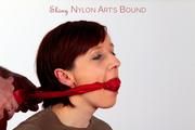 Nicole tied and gagged in black shorts