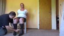 Cuffed on a chair 001