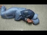 0300 min video with Simone tied and gagged in shiny nylon sky suit 