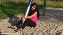 Sitting unable to move in the sand