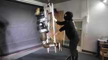 Rachel Adams bound, gagged and suspended in shiny nylon Down