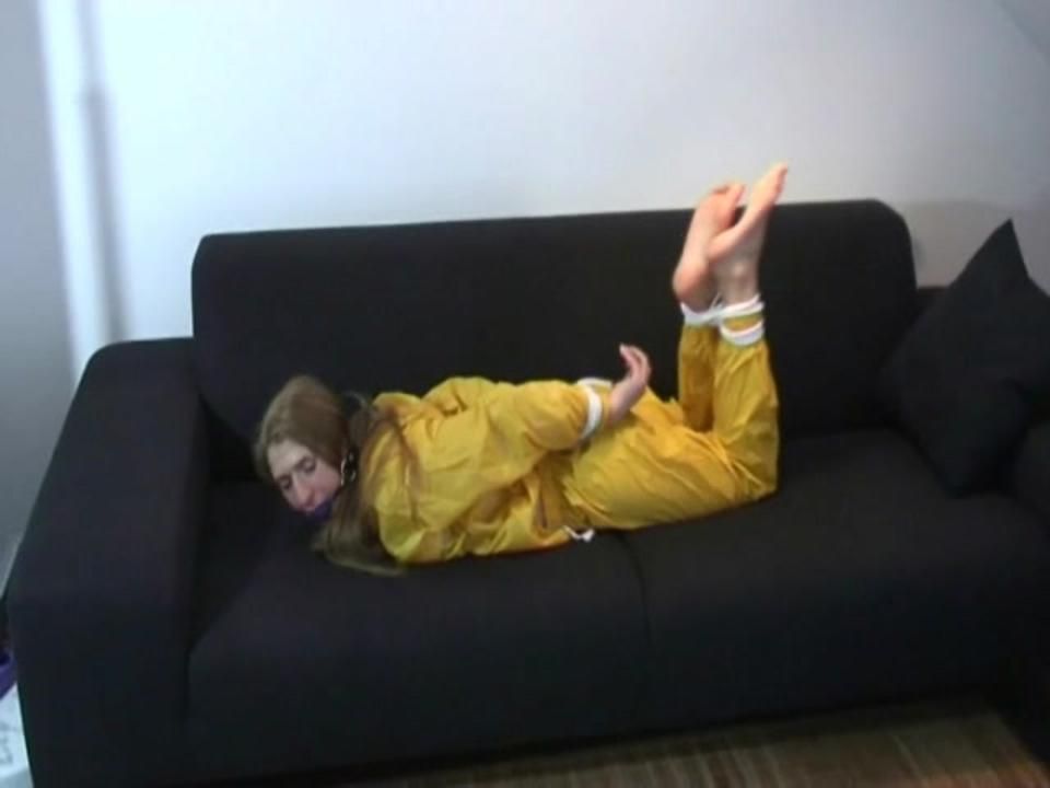 Two Short Videos With Our Archive Girls Tid And Gagged In Shiny Nylon Rainwear