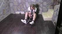 Rija Mae securely chained