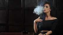 Gorgeous brunette Daria enjoying a cigarette in the hot smoking video