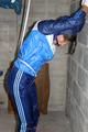Alina tied and gagged in shiny nylon clothes