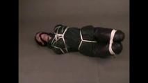 4 short videos in one of an beautiful black haired archive girl tied and gagged on the floor wearing sexy shiny nylon rainwear (Video)