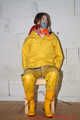 Miss J ziptied and gagged in3 layers of raingear, hard gagged and hooded