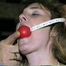 31 Yr OLD SEXY SUSIE IS TIED UP IN HER BASEMENT TO A POLE, BALL-GAGGED, TOPLESS, PANTYLESS, GARTER BELT, NYLON STOCKINGS, AND HIGH HEELS (D58-1)