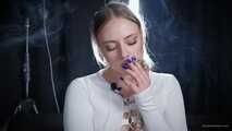 Smoking strong cork cigarette in the studio