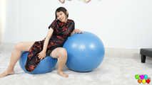 773 Yuli practices on the exercise ball.