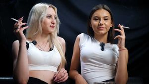 Two Beautiful Girls Smoking Together in white socks