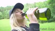 Vanessa is drinking in a hut