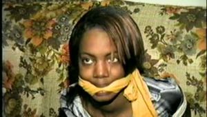 19 Yr OLD KISHA IS BOUND SITTING THEN HOG-TIED & CLEAVE GAGGED ON SOFA (D34-6)