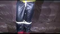 MARA tied and gagged overhead with ropes and a ballgag wearing a super sexy super shiny black rain pants, rubber boots and a yellow down jacket (Video)