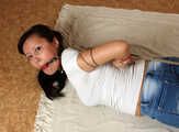 Ballgagged barefoot Lois, hogtied with japanese combat tying system, wiggles on the floor
