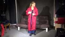 Watching sexy Sandra wearing a supersexy long rainwear skirt trying on several rain coats with hoods (Video)